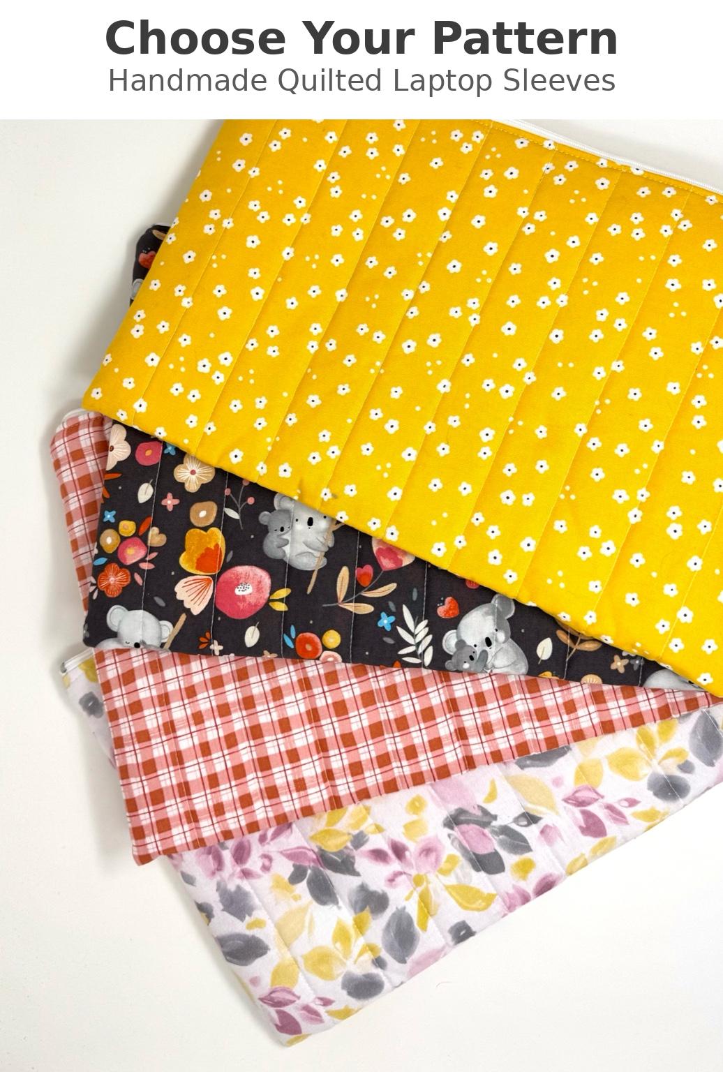 Stack of handmade quilted laptop sleeves in multiple fabric patterns including yellow floral, dark floral, gingham, and soft prints
