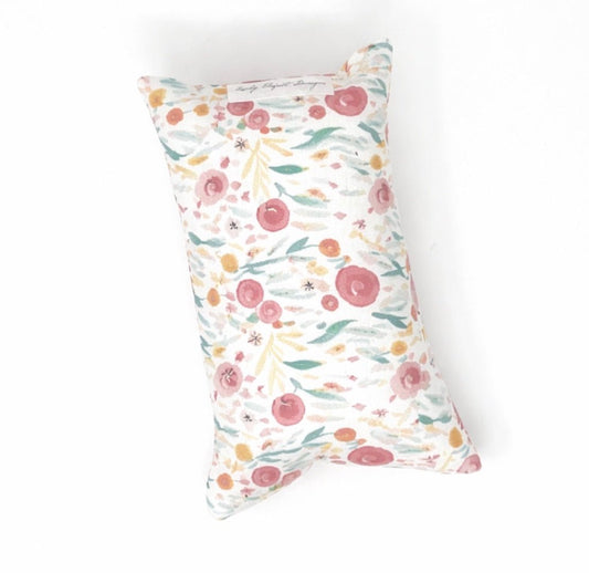 Neutral floral chemo port pillow providing soft support and comfort for chest port during chemotherapy treatment