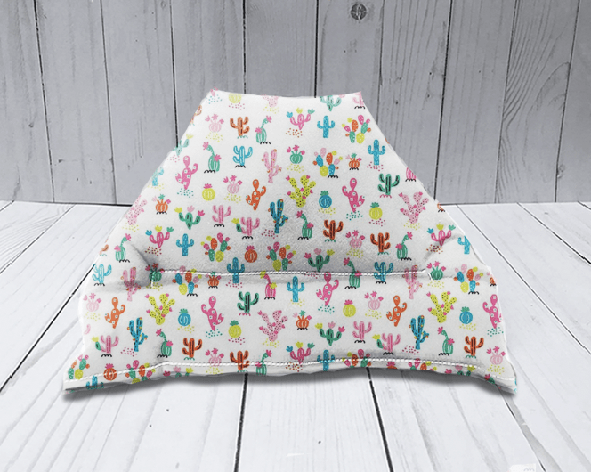 Handmade cactus print tablet and book pillow stand made from soft cotton fabric for comfortable hands-free reading