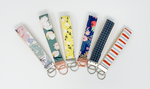 Load image into Gallery viewer, Rifle Paper Red Blue Stripe Key Fob Wristlet
