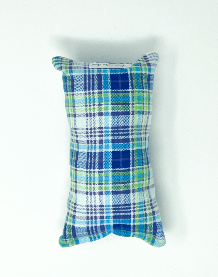 Blue and green plaid handmade chemo port pillow designed to protect chest port and provide gentle cushioning