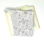 Load image into Gallery viewer, black and white woodland animal book tablet sleeve
