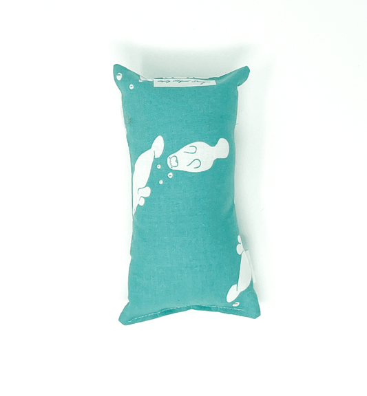 Teal manatee print chemo port pillow designed to cushion chest port and reduce seatbelt pressure during car rides and recovery
